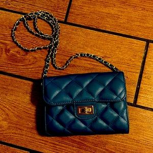 Mini handheld purse with a chain to go over your shoulder